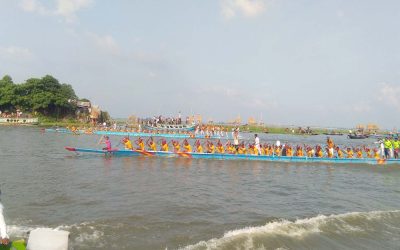 উৎসবমূখর পরিবেশে তিতাস নদীতে নৌকাবাইচ